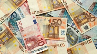 Lots of various Euro cash notes covering the photo.