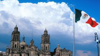 The Cathedral on the Zocalo Square and Mexican flag. Mexico City