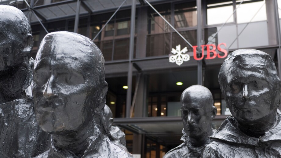 UBS headquarters at Broadgate, London, with the striking 'Rush Hour' sculpture by George Segal prominently displayed in the foreground, London, UK
