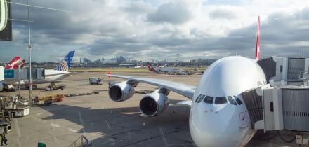 A Qantas Airbus A380-800 passenger aircraft parks at the gate at Kingsford Smith International Airport
