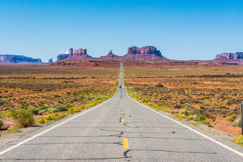 Long road leading into the Monument Valley, Arizona, United States of America, North America