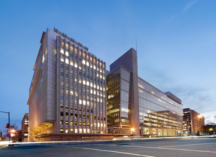 The World Bank Building headquarters main building at dusk. H Building 1818 H Street; Pennsylvania Avenue, Washington DC, USA