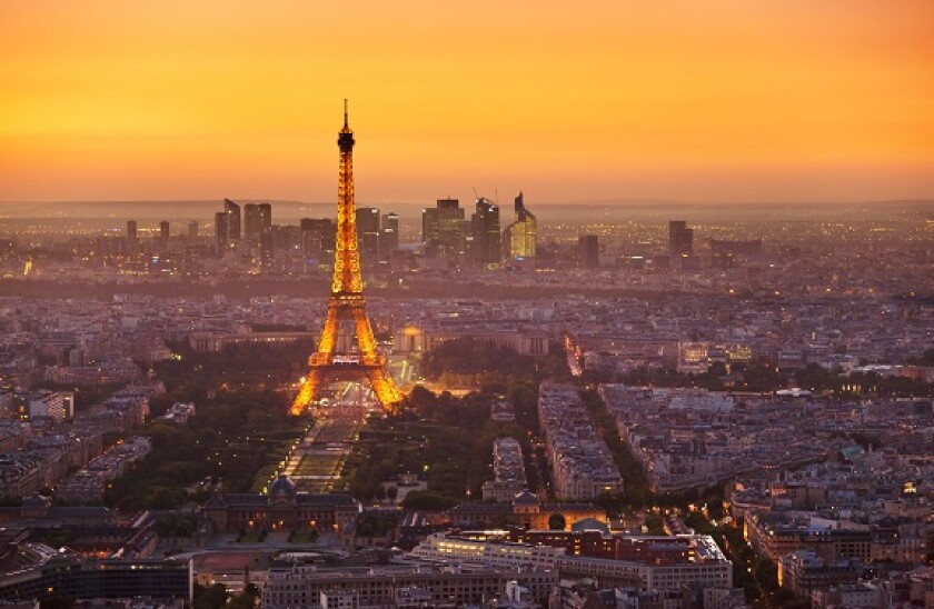 Paris skyline at sunset with the Eiffel Tower and La Defense, Paris, France, Europe