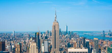 New York Manhattan, classic view in summer of the Midtown Manhattan skyline with the Empire State building sited at centre, New York City, USA