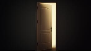 Open door with light in dark room