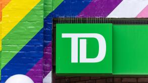 Business sign or logo of the Toronto Dominion or TD bank surrounded by Pride rainbow colors seen in the downtown district of Toronto city, Canada