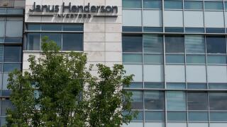 A logo sign outside of a facility occupied by the Janus Henderson Group in Denver, Colorado, on July 23, 2018.