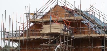 File photo dated 07/01/20 of houses under construction on a housing development in Basingstoke, Hampshire. The UK's construction sector saw growth ease back last month after striking a two-year high in September, according to new data. It was partly drive