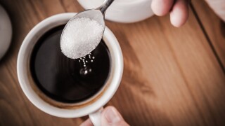 Adding Sugar to Coffee-sweeten-adobe-2022