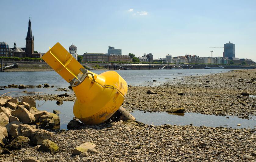 Low stream gauge of river rhine in germany.Water shortage, drought, climate change and global warming concept.