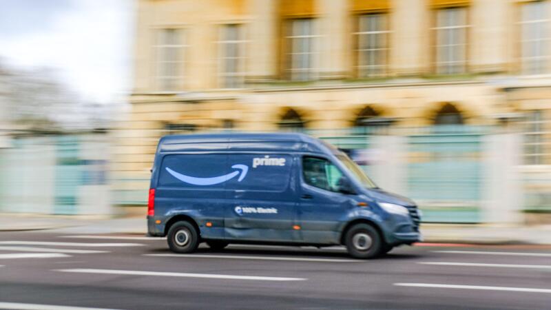 LONDON- FEBRUARY 19, 2024: Amazon Prime delivery van in motion on London street