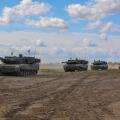 Leopard 2 tanks assigned to the Royal Danish Army advance onto the field during a multinational live-fire exercise at Mielno Range, Poland, May 27, 2022. Defender Europe 22 is a series of U.S. Army Europe and Africa multinational training exercises in Eas