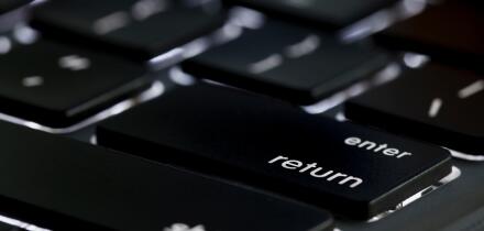 Illuminated Apple Macbook Pro keyboard return key - USA