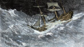 Sailing-ship struggling through stormy seas. Hand-colored woodcut