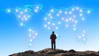 Person viewing map of the world