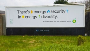 ClearChannel advertising billboard for BP on hoarding in Newport South Wales UK