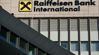 A logo sign outside of the headquarters of Raiffeisen Bank International (RBI) in Vienna, Austria, on September 5, 2018.