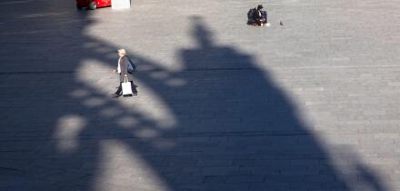 Coronavirus / Covid 19 outbreak, March 24th. 2020. Only few people on the square in front of Cologne central station, shadow of the cathedral, Germany