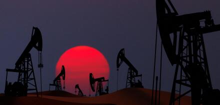 Oil pumps silhouette at  sunset