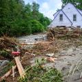 Plainfield, Vermont, USA. 11 July, 2024. Flood debris surrounds a house on Brook Road in Plainfield, VT, USA, after torrential rains from the remnants of Hurricane Beryl hit central Vermont, USA. John Lazenby/Alamy Live News
