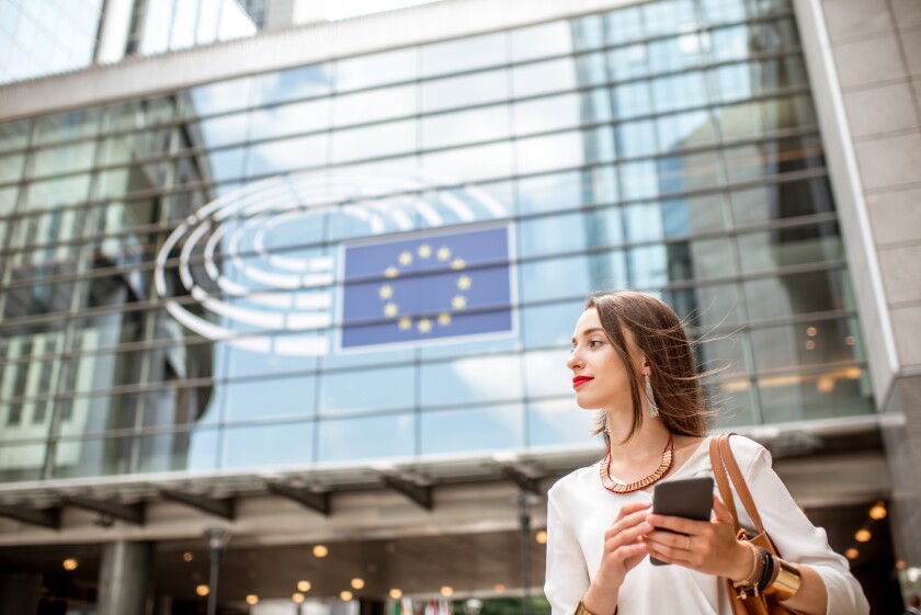 Businesswoman near the parliament building in Brussel