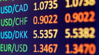 Currency exchange rates on LCD display closeup