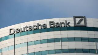 A logo sign outside of an office building occupied by Deutsche Bank in Amsterdam, Netherlands on October 4, 2015.