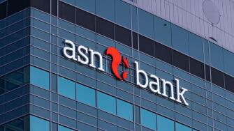 The logo of ASN Bank on the glass facade of a modern corporate building, representing finance and banking. Utrecht, Netherlands. 11 July 2025.