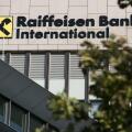 A logo sign outside of the headquarters of Raiffeisen Bank International (RBI) in Vienna, Austria, on September 5, 2018. (Photo by Kristoffer Tripplaar/Sipa USA)