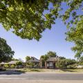 The suburban street with houses and trees in Beechworth, Victoria, Australia