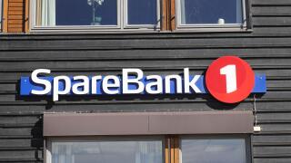 Storen, Norway - September 2, 2022: Close-up view of the Sparebank 1 bank office exterior sign.