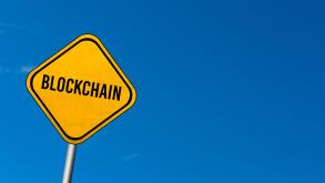 Blockchain - yellow sign with blue sky