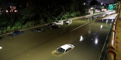 New York, USA. 2nd Sep, 2021. Vehicles are submerged on a waterlogged road in New York, the United States, Sept. 2, 2021. New York State Governor Kathy Hochul declared her first state of emergency early Thursday as remnants of Hurricane Ida brought torren