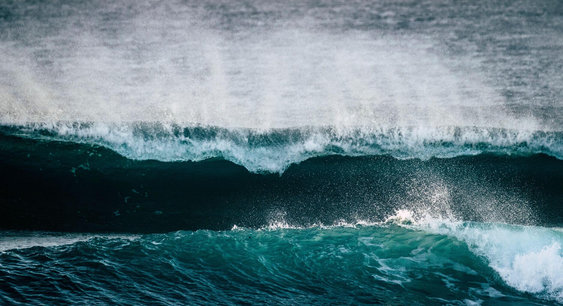 Dangerous powerful energy wave big splash white foam and blue deep water - oceanic storm and bad weather climate change for world disease for temperature changed - surfer break point