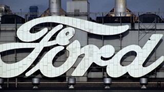 AJAXNETPHOTO. 1970S. DAGENHAM, ESSEX, ENGLAND - CAR FACTORY - ENORMOUS ICONIC BRAND NAME ON THE FORD FACTORY OVERLOOKING THE RIVER THAMES. PHOTO:JONATHAN EASTLAND/AJAX. Image shot 1972. Exact date unknown.