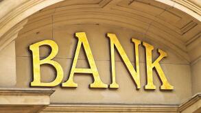 Gold Bank sign at the entrance to a Banking institute in the centre of the financial sector
