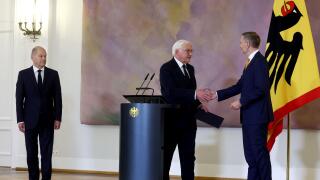 Berlin, Germany. 07th Nov, 2024. Federal President Frank-Walter Steinmeier (M) hands Christian Lindner (r/FDP), former Federal Minister of Finance, his certificate of dismissal at Bellevue Palace. Federal Chancellor Olaf Scholz (SPD) looks on. Credit: Chr