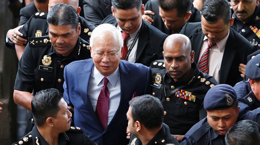 Former Malaysian prime minister Najib Razak arrives in court in Kuala Lumpur