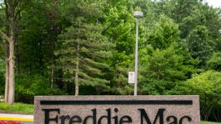 A logo sign outside of the headquarters of the Federal Home Loan Mortgage Corporation (FHLMC), known as Freddie Mac, in Tysons C