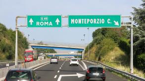 Traffic on Italian Autostrada (highway, motorway) near Rome in Lazio, Italy