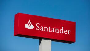 A logo sign outside of a Santander Bank branch in Camp Hill, Pennsylvania on July 30, 2017.