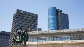 Statue beneath Financial district skyscrapers with Deutsche Bank building and Main Tower Helaba, Frankfurt am Main, Hessen, Germ