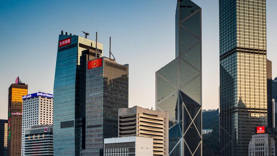 Hong Kong Skyscrapers - Modern Skyscraper towers on the waterfront on Hong Kong island, Hong Kong China. Bank of China buildings & Cheung Kong Centre.