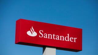 A logo sign outside of a Santander Bank branch in Camp Hill, Pennsylvania on July 30, 2017.