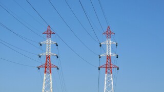 power lines in blue sky Auvergne France