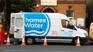 Thames water lorry / van / vans / vehicles at the site of a blocked pipe / drain / drainage / sewer blockage attended by their staff and workers in Twickenham, West London. UK (96)