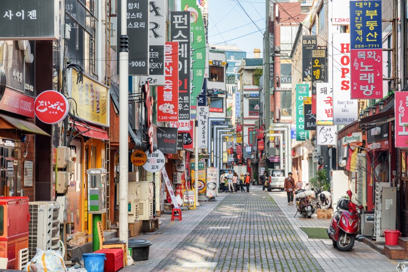 Morning view of signboards on deserted street. South Korea-adobe-2022