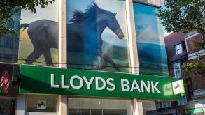 Lloyds bank with picture of black horse above the branch on Oxford street, London, England, U.K.