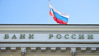 MOSCOW, RUSSIA - FEBRAURY 28, 2022: A Russian national flag flies outside the Central Bank of the Russian Federation (Bank of Russia). The Bank of Russia has decided to raise the key rate from 9.5% to 20% per annum on 28 February 2022. Mikhail Tereshchenk