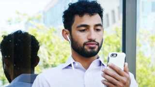 Zoom man on phone.jpg